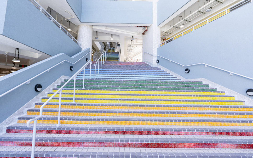 The “Rainbow Staircase” that connects building blocks resembles “Progress Learning”- students grow in strength, wisdom and faith year after year.